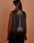 Black palm vest