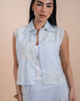 Blue sleeveless shirt embro