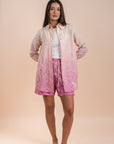 Grading yellow/pink embro shirt