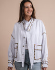 Restocking _white denim jacket gold embelishments