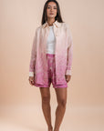 Grading yellow/pink embro shirt