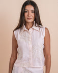Peach sleeveless shirt embro
